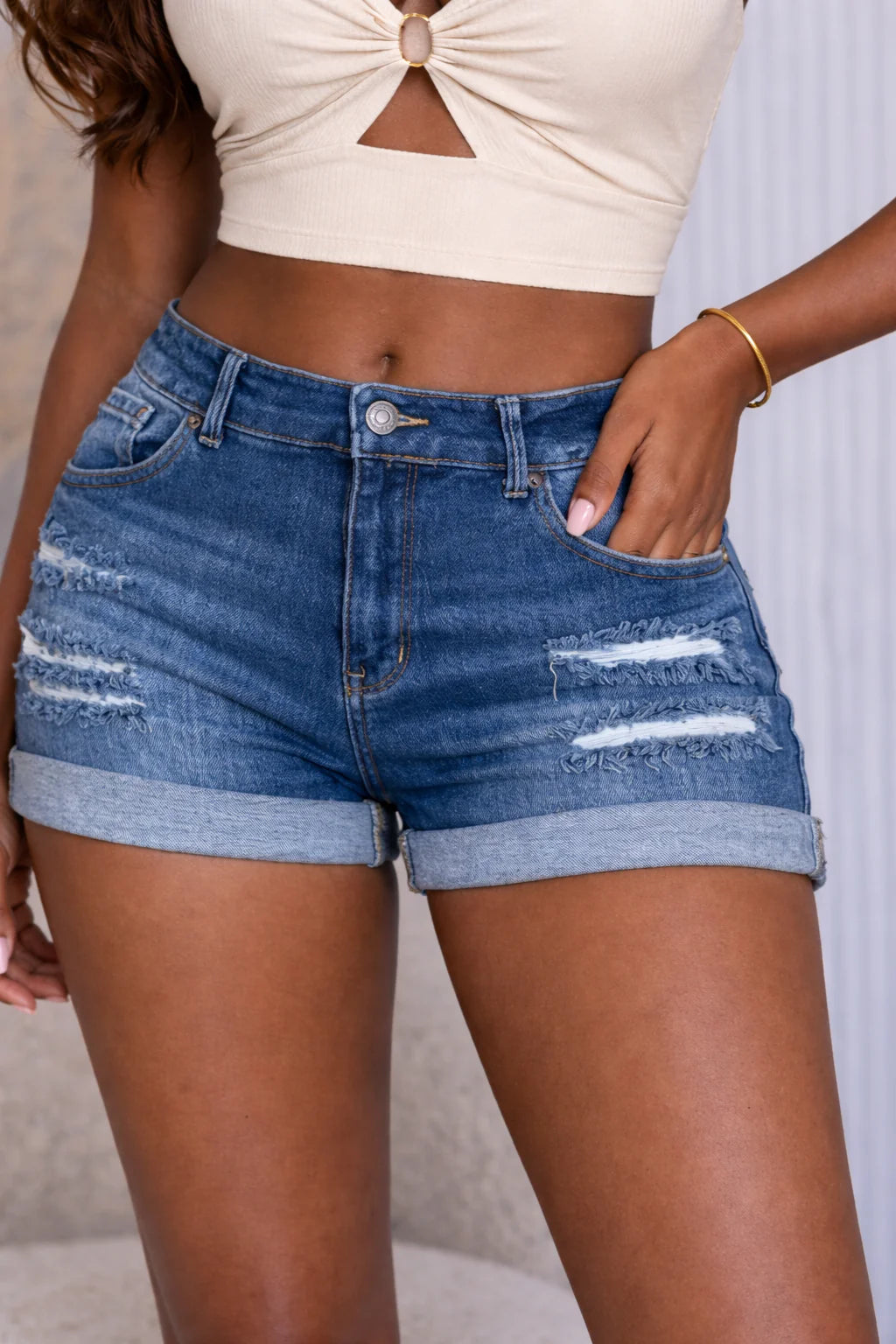 Distressed denim shorts